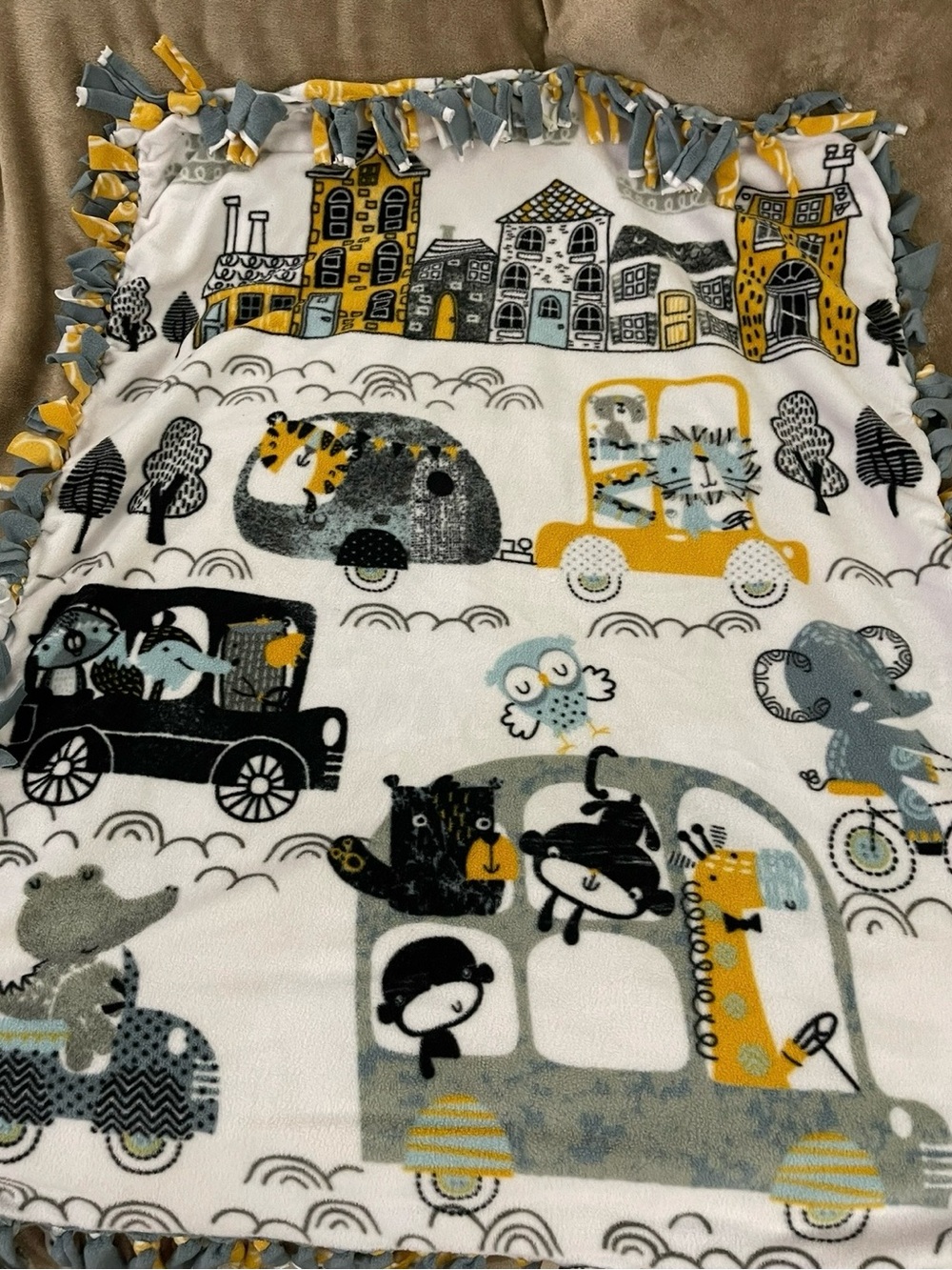 Multi Design & Color Reversible 38” X 54” Fleece Tie Blanket